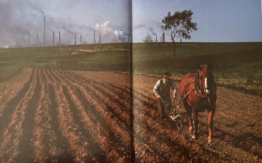Bruno Barbey and "Portrait of Poland" (1982) - a farmer plowing near Cracow, with the steelworks of Nowa Huta